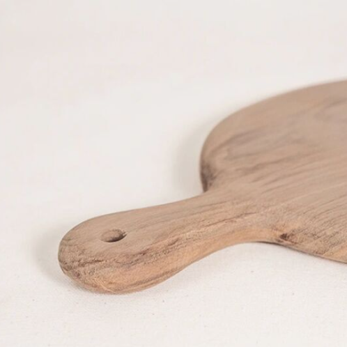 Planche ronde à découper en noyer