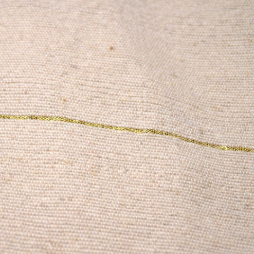 Plaid à pompons rayures dorées